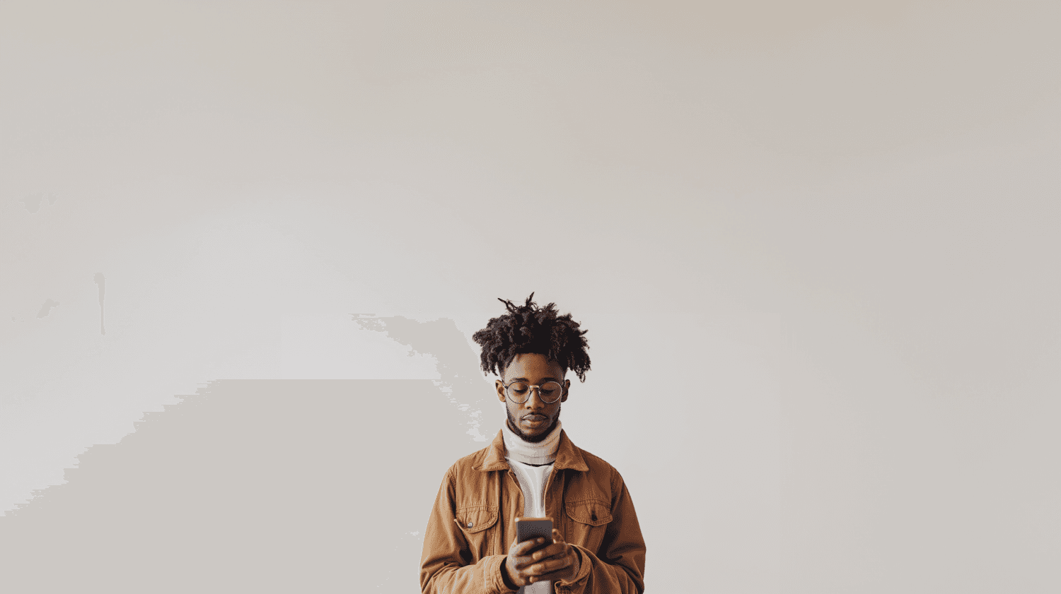 A man checking photos on his phone